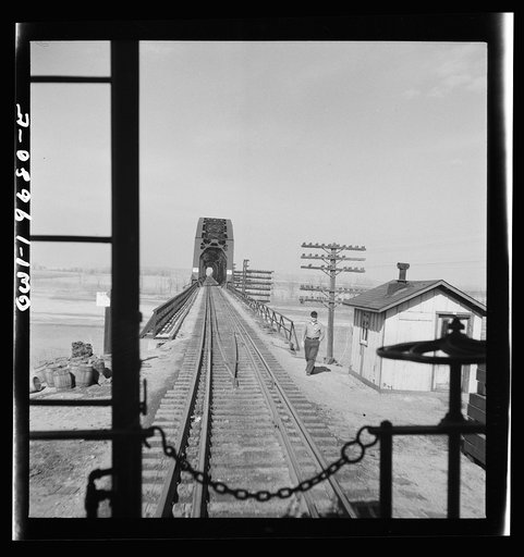 A guard stationed at Sibley bridge across the Missouri river along the route of the Atchison, Topeka, and Santa Fe Railroad between Marceline, Missouri and Argentine, Kansas
