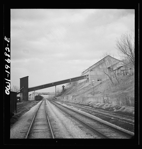 Cement City, Missouri. Passing a cement plant along the Atchison, Topeka, and Santa Fe Railroad between Marceline, Missouri, and Argentine, Kansas