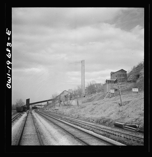 Untitled photo, possibly related to: Cement City, Missouri. Passing a cement plant along the Atchison, Topeka, and Santa Fe Railroad between Marceline, Missouri, and Argentine, Kansas