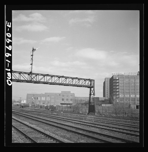 Untitled photo, possibly related to: Kansas City, Missouri. Atchison, Topeka, and Santa Fe Railroad tracks, approaching Kansas City