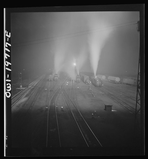 Untitled photo, possibly related to: Argentine, Kansas. Night view of the Atchison, Topeka, and Santa Fe Railroad shops and roundhouse