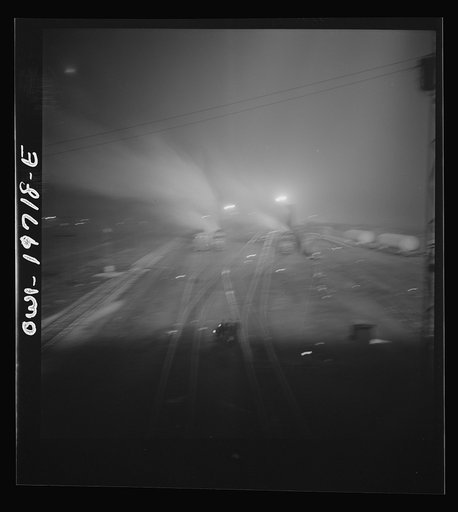 Untitled photo, possibly related to: Argentine, Kansas. Night view of the Atchison, Topeka, and Santa Fe Railroad shops and roundhouse