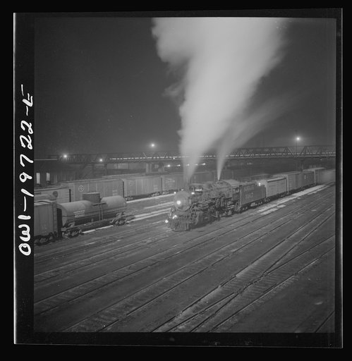 Argentine, Kansas. Freight train about to leave the Atchison, Topeka, and Santa Fe Railroad yard for the west coast