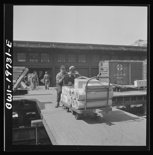 Kansas City, Missouri. Charles O'Brannen, left, and Eula Greer, freight handlers at the Atchison, Topeka, and Santa Fe freight depot