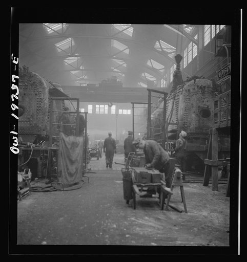 Untitled photo, possibly related to: Topeka, Kansas. A general view of part of the Atchison, Topeka, and Santa Fe Railroad locomotive shops