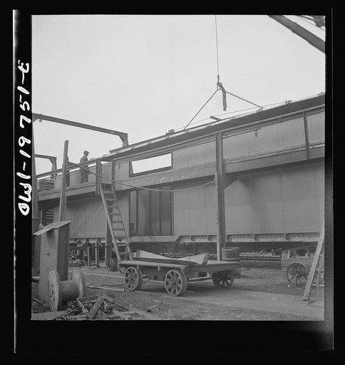 Untitled photo, possibly related to: Topeka, Kansas. General view of part of the Atchison, Topeka and Santa Fe Railroad car building shops