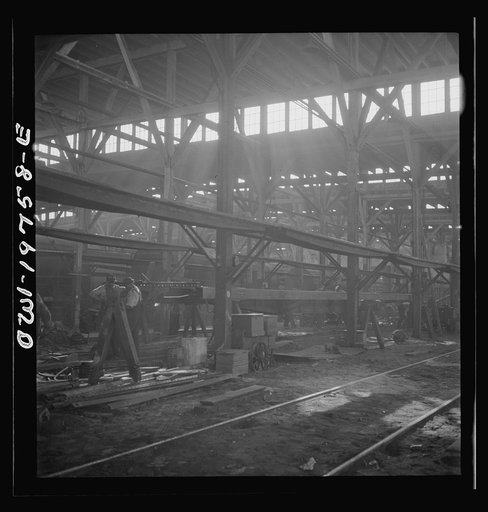 Topeka, Kansas. In the shops of the Atchison, Topeka and Santa Fe Railroad, cars are completely stripped and rebuilt from the ground up