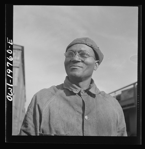 Topeka, Kansas. Robert L. Hill, steel car repairer and rivet driver, at the car shops of the Atchison, Topeka and Santa Fe Railroad