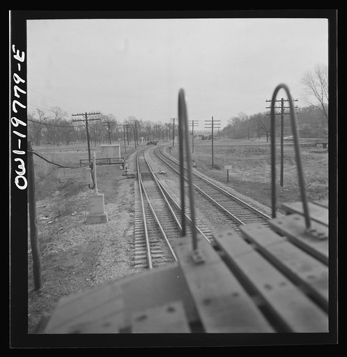 Untitled photo, possibly related to: Craig, Kansas. Track crossover. For twelve and one half miles west of Argentine, the track reversal system is used