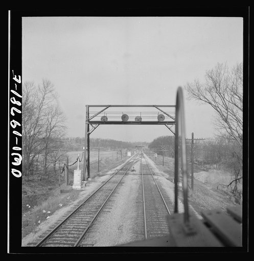 Untitled photo, possibly related to: Craig, Kansas. Track crossover. For twelve and one half miles west of Argentine, the track reversal system is used
