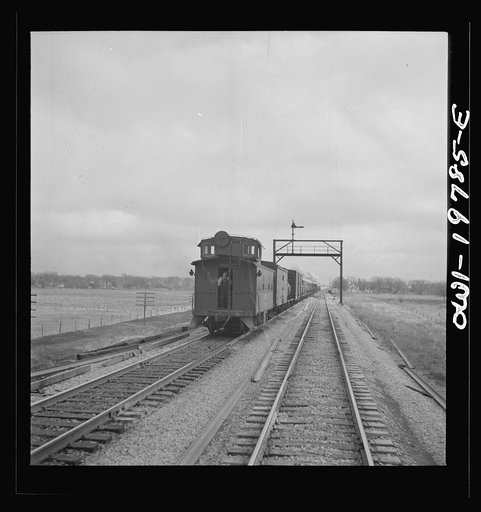 Untitled photo, possibly related to: Craig, Kansas. Track crossover. For twelve and one half miles west of Argentine, the track reversal system is used