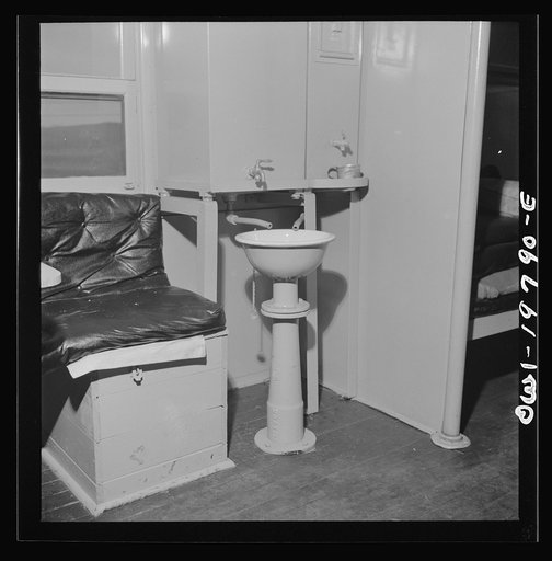 Washbasin in a caboose on the Atchison, Topeka, and Santa Fe Railroad between Argentine and Emporia, Kansas. Spigot on the right is for drinking water; the one on the left is for wash water