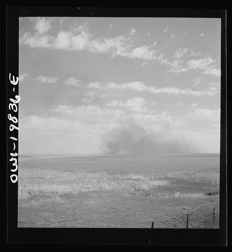Argonis, Kansas. Crossing wheat fields along the Atchison, Topeka, and Santa Fe Railroad between Wellington, Kansas and Waynoka, Oklahoma