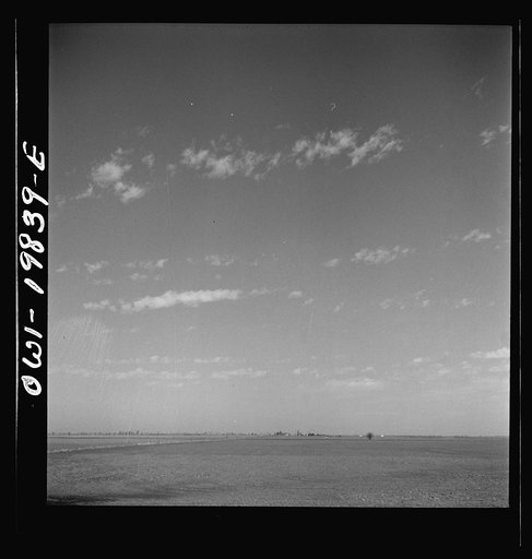 Untitled photo, possibly related to: Argonis, Kansas. Crossing wheat fields along the Atchison, Topeka, and Santa Fe Railroad between Wellington, Kansas and Waynoka, Oklahoma