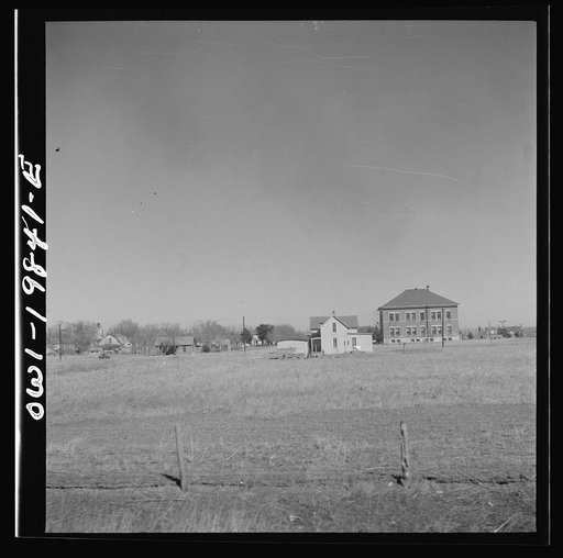 Argonis, Kansas. A schoolhouse and part of the town on the Atchison, Topeka and Santa Fe Railroad between Wellington, Kansas and Waynoka, Oklahoma