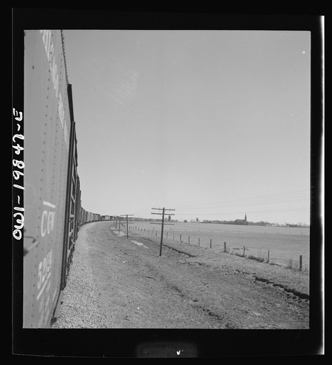 Harper, Kansas. Atchison, Topeka and Santa Fe Railroad train between Wellington, Kansas and Waynoka, Oklahoma approaching the town