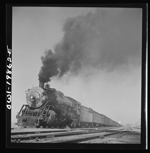 Kiowa, Kansas. Freight train pulling out on the Atchison, Topeka and Santa Fe Railroad between Wellington, Kansas and Waynoka, Oklahoma
