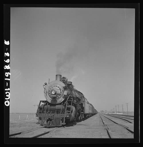 Kiowa, Kansas. Freight train pulling out on the Atchison, Topeka and Santa Fe Railroad between Wellington, Kansas and Waynoka, Oklahoma