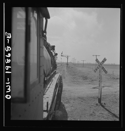 Kiowa (vicinity), Kansas. Train waiting for a block signal along the Atchison, Topeka, and Santa Fe Railroad
