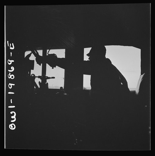 Untitled photo, possibly related to: Kiowa, Kansas. Engineer B. F. Hale in the cab of his engine on the Atchison, Topeka, and Santa Fe Railroad between Wellington, Kansas and Waynoka, Oklahoma