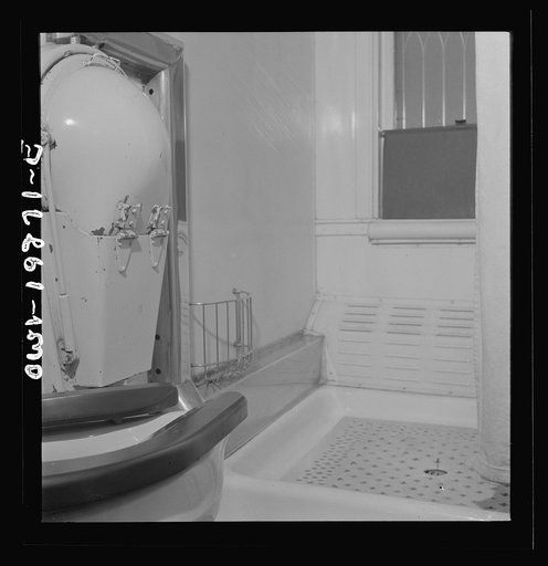 The bathroom of the business car is used by the Atchison, Topeka, and Santa Fe Railroad division superintendent of Wellington, Kansas