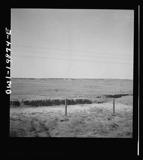 Untitled photo, possibly related to: Waynoka, Oklahoma. Eroded land along the Atchison, Topeka, and Santa Fe Railroad between Wellington, Kansas and Waynoka, Oklahoma