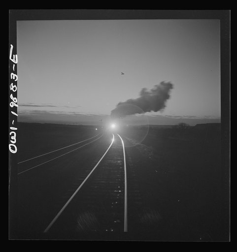 Untitled photo, possibly related to: Belva, Oklahoma. Helper engine coming to help push the train on the Atchison, Topeka, and Santa Fe Railroad as far as Curtis, Oklahoma