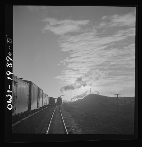 Untitled photo, possibly related to: Belva, Oklahoma. Helper engine coming to help push the train on the Atchison, Topeka, and Santa Fe Railroad as far as Curtis, Oklahoma