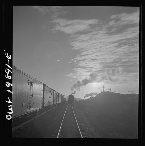 Untitled photo, possibly related to: Curtis, Oklahoma. Helper engine leaving the train on Atchison, Topeka, and Santa Fe Railroad