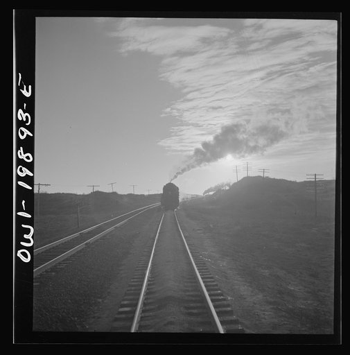 Untitled photo, possibly related to: Curtis, Oklahoma. Helper engine leaving the train on Atchison, Topeka, and Santa Fe Railroad