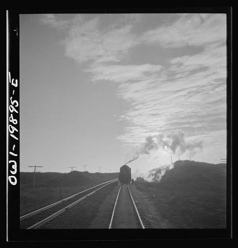 Untitled photo, possibly related to: Curtis, Oklahoma. Helper engine leaving the train on Atchison, Topeka, and Santa Fe Railroad