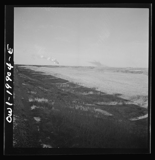 Fargo, Oklahoma. Atchison, Topeka, and Santa Fe train rounding a curve