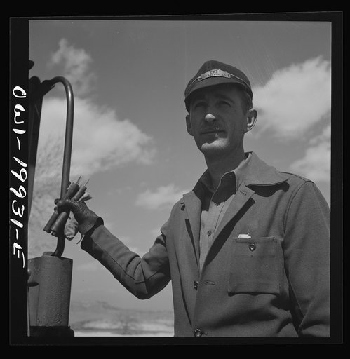 Untitled photo, possibly related to: Miami, Texas. On the Atchison, Topeka and Santa Fe Railroad between Canadian, Texas and Amarillo, Texas. Brakeman C. B. Masable, waiting for the train to start after it has taken water