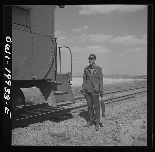 Miami, Texas. On the Atchison, Topeka and Santa Fe Railroad between Canadian, Texas and Amarillo, Texas. Brakeman C. B. Masable, waiting for the train to start after it has taken water