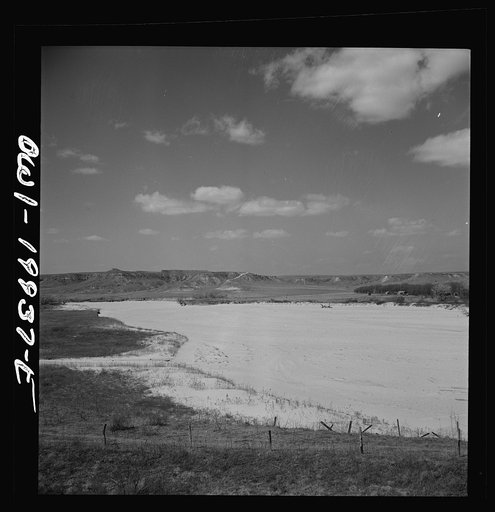 A dry riverbed in the "breaks" country of the northeast Texas Panhandle along the Atchison, Topeka and Santa Fe Railroad, between Canadian and Amarillo, Texas