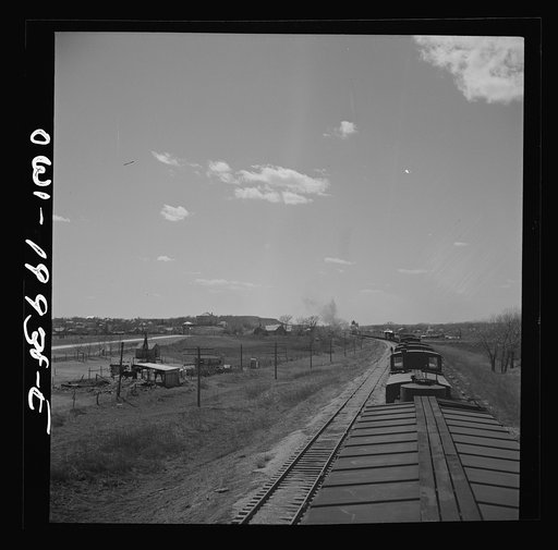 Miami, Texas. Train stopping for water along the Atchison, Topeka, and Santa Fe Railroad between Canadian and Amarillo, Texas
