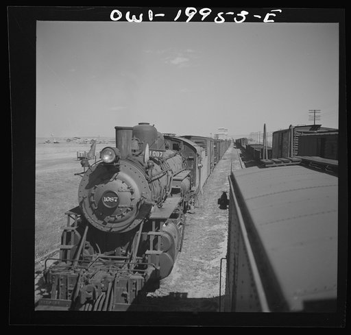 Untitled photo, possibly related to: Kiowa, Kansas. Freight train pulling out on the Atchison, Topeka and Santa Fe Railroad between Wellington, Kansas and Waynoka, Oklahoma