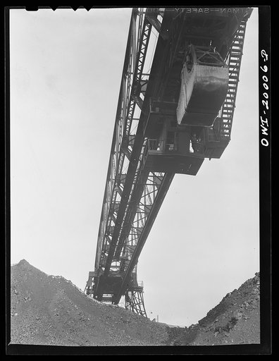 Milwaukee Western Fuel Company, Milwaukee, Wisconsin. One of the bridges at the Seventeenth Street dock of the Milwaukee Western Fuel Company with a five-ton coal bucket. The bridge is used for unloading ships, loading cars, keeping coal over the tunnel and loading coal into hoppers
