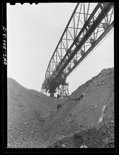 Milwaukee Western Fuel Company, Milwaukee, Wisconsin. One of the bridges at the Seventeenth Street dock of the Milwaukee Western Fuel Company with a five-ton coal bucket. The bridge is used for unloading ships, loading cars, keeping coal over the tunnel and loading coal into hoppers