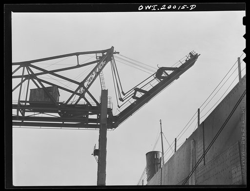 Milwaukee Western Fuel Company, Milwaukee, Wisconsin. Lowering the boom of one of the bridges to unload coal from a ship at the Seventeenth Street dock of the Milwaukee Western Fuel Company