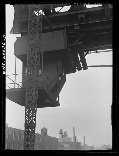 Milwaukee Western Fuel Company, Milwaukee, Wisconsin. Bridge operator in his cab at the Fourteenth Street dock of the Milwaukee Western Fuel Company