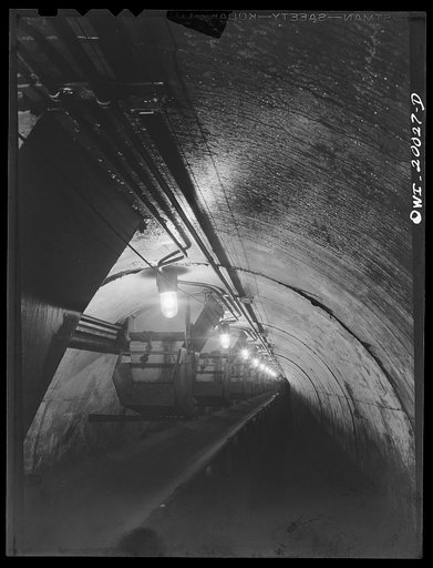 Milwaukee Western Fuel Company, Milwaukee, Wisconsin. The tunnel at the Seventeenth Street docks of the Milwaukee Western Fuel Company. This is an underground tunnel that runs underneath the coal piles along the entire length of the Seventeenth Street dock. It is nine feet high and is in two section