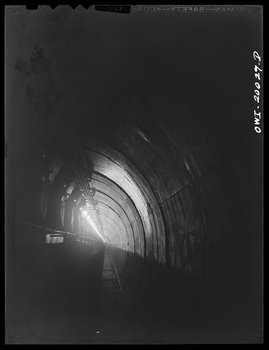 Untitled photo, possibly related to: Milwaukee Western Fuel Company, Milwaukee, Wisconsin. The tunnel at the Seventeenth Street docks of the Milwaukee Western Fuel Company. This is an underground tunnel that runs underneath the coal piles along the entire length of the Seventeenth Street dock. It is