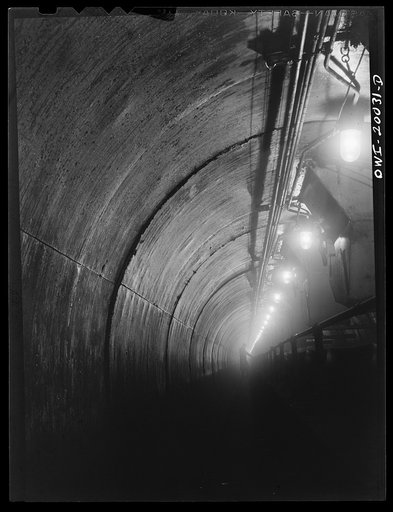 Milwaukee Western Fuel Company, Milwaukee, Wisconsin. The tunnel at the Seventeenth Street docks of the Milwaukee Western Fuel Company. This is an underground tunnel that runs underneath the coal piles along the entire length of the Seventeenth Street dock. It is nine feet high and is in two section