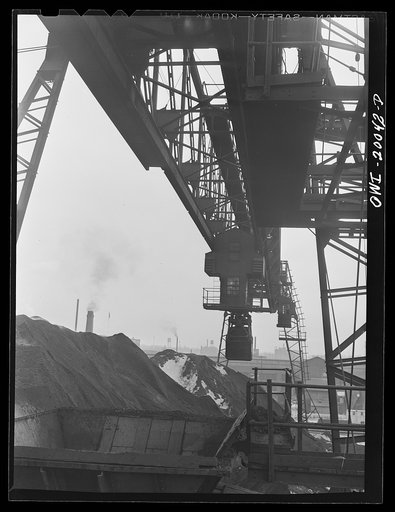 Milwaukee Western Fuel Company, Milwaukee, Wisconsin. One of the bridges at the Seventeenth Street dock of the Milwaukee Western Fuel Copany with a five-ton coal bucket. The bridge is used for unloading ships, loading cars, keeping coal over the tunnel and loading coal into hoppers