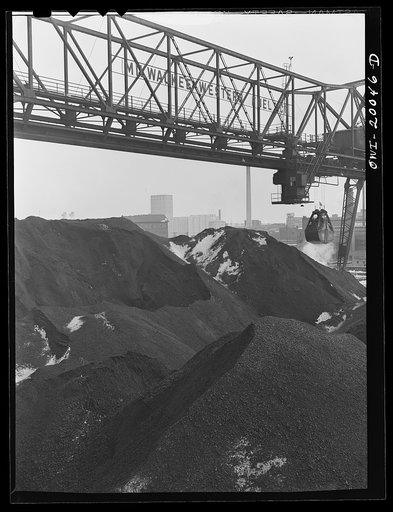 Milwaukee Western Fuel Company, Milwaukee, Wisconsin. One of the bridges at the Seventeenth Street dock of the Milwaukee Western Fuel Company with a five-ton coal bucket. The bridge is used for unloading ships, loading cars, keeping coal over the tunnel and loading coal into hoppers