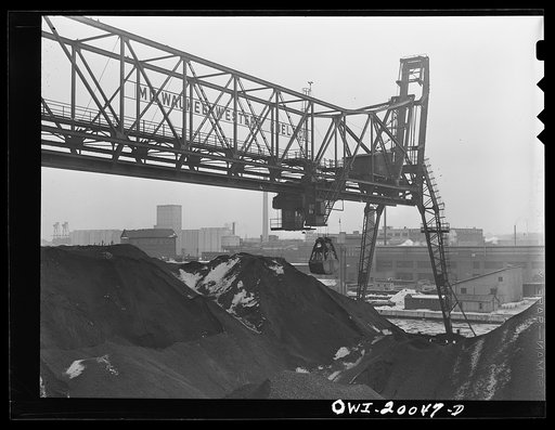 Milwaukee Western Fuel Company, Milwaukee, Wisconsin. One of the bridges at the Seventeenth Street dock of the Milwaukee Western Fuel Company with a five-ton coal bucket. The bridge is used for unloading ships, loading cars, keeping coal over the tunnel and loading coal into hoppers