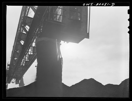 Untitled photo, possibly related to: Milwaukee Western Fuel Company. Milwaukee, Wisconsin. The car loading end of a bridge at the Seventeenth Street dock of the Milwaukee Western Fuel Company. The bucket drops coal into the hopper at the top, it is sized over screens, the proper size coal goes down 
