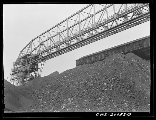 Milwaukee Western Fuel Company. Milwaukee, Wisconsin. One of the bridges at the Seventeenth Street dock of the Milwaukee Western Fuel Company with a five-ton coal bucket. The bridge used for unloading ships, loading cars, keeping coal over the tunnel and and loading coal into hoppers