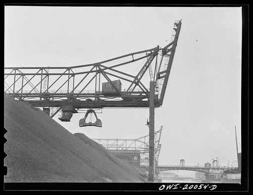 Milwaukee Western Fuel Company. Milwaukee, Wisconsin. One of the bridges at the Seventeenth Street dock of the Milwaukee Western Fuel Company with a five-ton coal bucket. The bridge used for unloading ships, loading cars, keeping coal over the tunnel and and loading coal into hoppers